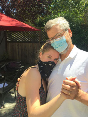 Dad and Daughter Dance with Masks